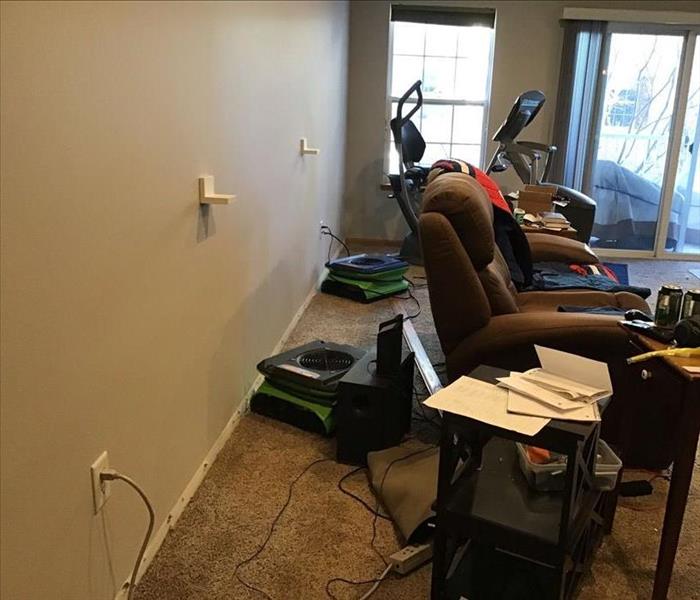 living room water damage cleanup in Chanhassen